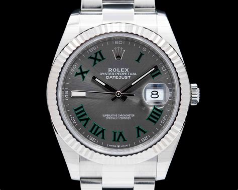 rolex watch with roman numerals.